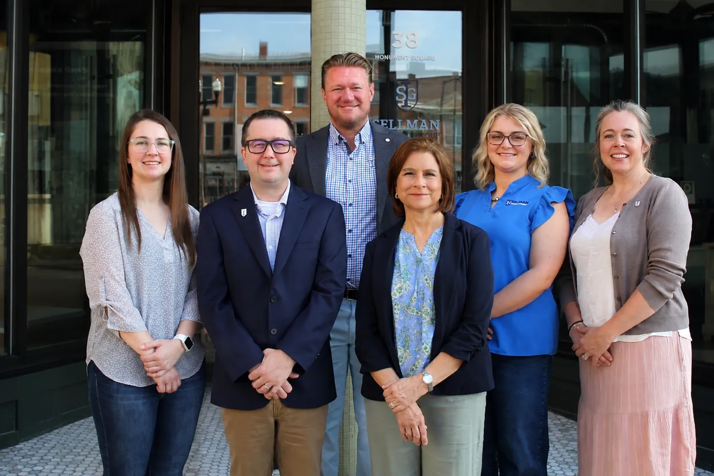 The Sellman Insurance Group team outside the office at 38 Monument Square in Urbana, Ohio